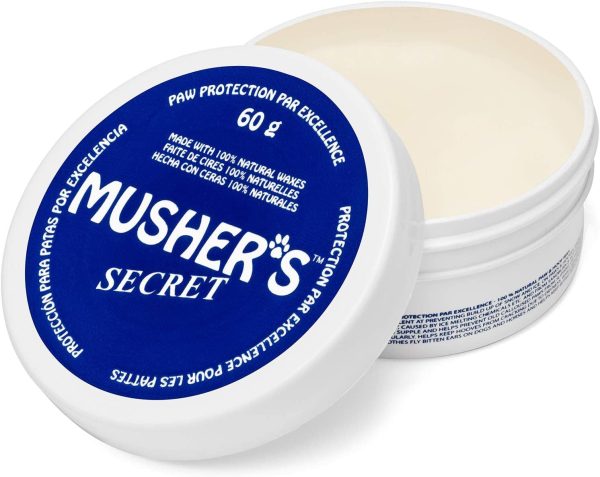 Musher's Secret Dog Paw Wax 60 g (2.1 oz) - Moisturizing Dog Paw Balm that Creates an Invisible Barrier That Protects and Heals Dry Cracked Paws - All-Natural with Vitamin E and Food-Grade Ingredients